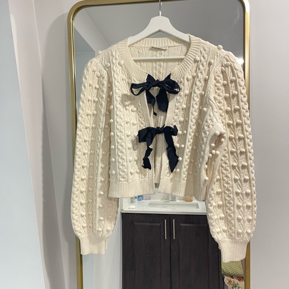 Alice + Olivia Sweaters - Alice + Olivia Kitty puff-sleeve cardigan cream with black bows size large